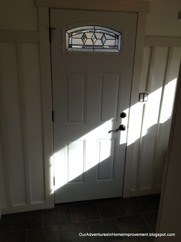mudroom remodel from pass through to fab, diy, home improvement, laundry rooms, Pretty door with the sun hitting the glass