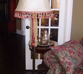 yard sale lamp painted spruced up my alltime favorite find, home decor, The finished refurbished lamp a little black paint with gold brushed over new fabric on the shade and a bit of sparkle with the cording and lacy tie on The shade trim came from a footstool that I found on the side of the road