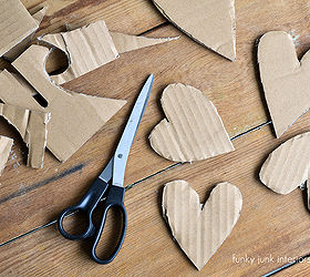 rustic valentines you won t want to take down or give away oops, crafts, valentines day ideas, Hearts were cut free hand out of corrugated cardboard I was after every one being different That worked