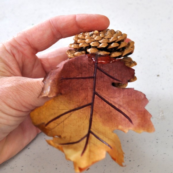 gobble turkey centerpiece for your thanksgiving table, seasonal holiday d cor, thanksgiving decorations, Step 1 Gluing the leaves in the pine cone