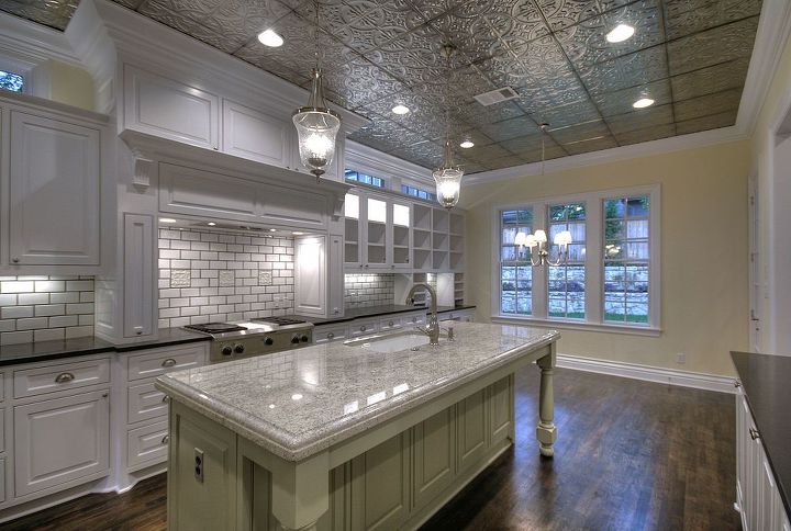 how to cover ugly popcorn ceilings or drywall, Tin ceilings are a great way to brighten up a kitchen