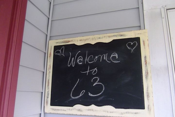 perked up porch, outdoor living, porches, Found a chalkboard frame an used it as house address