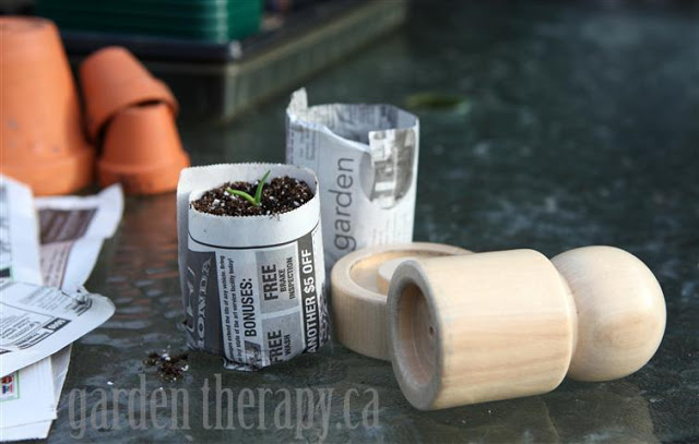starting spring seeds indoors, container gardening, flowers, gardening, Rolling newspapers to make pots by Garden Therapy