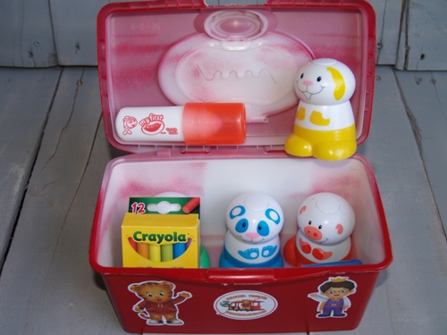 another upcycle of plastic container, repurposing upcycling, My grandson loves Daniel Tiger and I found a way to use a Huggies Wipes container with Daniel Tiger stickers to get organized