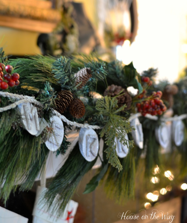 create a classic christmas mantel, seasonal holiday d cor, Wood and rope garland add fun to green garland