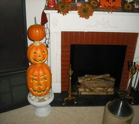 my fall and inside decorating for halloween, halloween decorations, seasonal holiday d cor, My fake fireplace I bought two years ago and just put it in the livingroom and decorated it got it at a garage sale for 100 fake logs light up will work til I get a real one some day