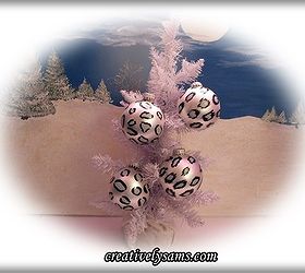 snow leopard ornaments tutorial, christmas decorations, crafts, seasonal holiday decor, These are the finished Christmas Ornaments hanging on a tree