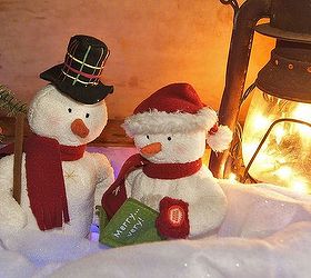 winter wonderland scene nestled in world war ii footlocker, repurposing upcycling, seasonal holiday decor, Mr Mrs Snowman resting by the glow of an old railroad lantern