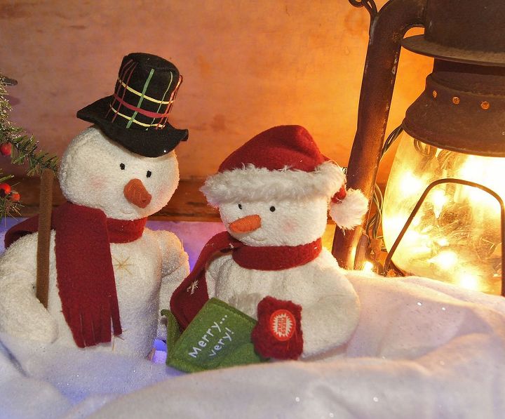 winter wonderland scene nestled in world war ii footlocker, repurposing upcycling, seasonal holiday decor, Mr Mrs Snowman resting by the glow of an old railroad lantern
