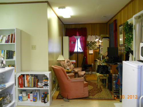 living room makeover, living room ideas, painting, Putty yellow painted walls and outdated dreary 70 s paneling