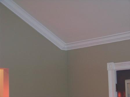 crown molding and fireplace, crown transition up sloped ceiling