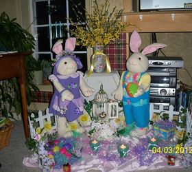 spring has sprung and easter is almost here, christmas decorations, easter decorations, seasonal holiday d cor, wreaths, hoppin down the bunny trail An old plastic fence worked just fine for this display I NEVER throw out old silk flowers when re doing wreaths or floral designs No matter how faded or bedraggeled they may seem they can always be reused somehow