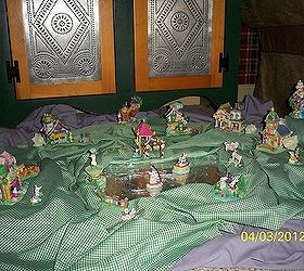 spring has sprung and easter is almost here, christmas decorations, easter decorations, seasonal holiday d cor, wreaths, My grand daughter s mini Easter Village A Mirror is used to create a pond effect Some cling wrap was used to simulate ripples in the water sort of