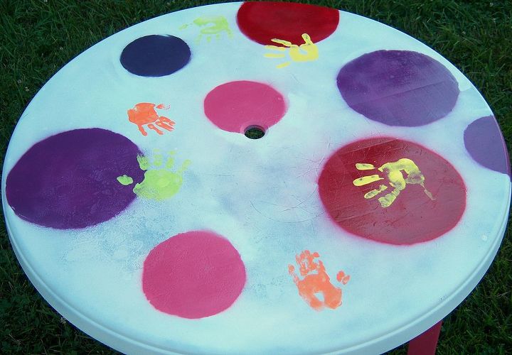refurbished plastic patio table, outdoor furniture, outdoor living, painted furniture, patio, I let my daughter and two nephews put handprints on it