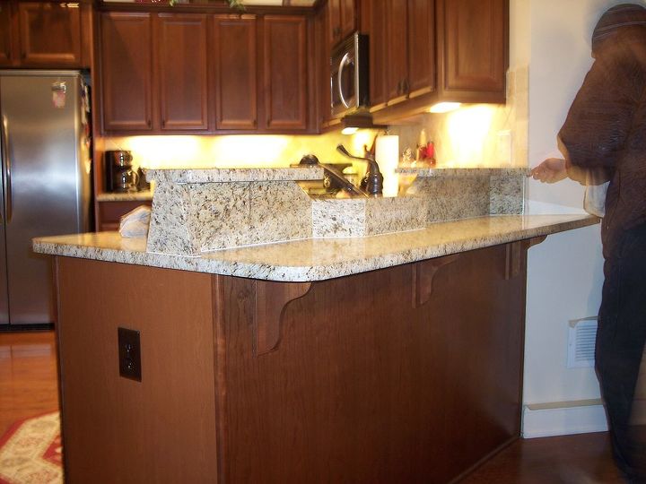 the homeowner did not like their peninsula top bar area it made them feel like they, we added this to an exsisting Granite top Color matched pretty good