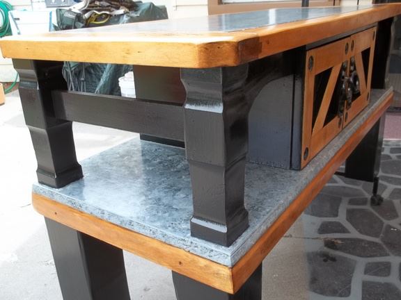 recycling an old out dated coffee table into a useful kitchen island, As you can see I trimmed in a flat black paint and did faux painting on the side shelves
