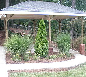 build carport over parking pad and add concrete walkway, Side view of carport and walkway to storage pad