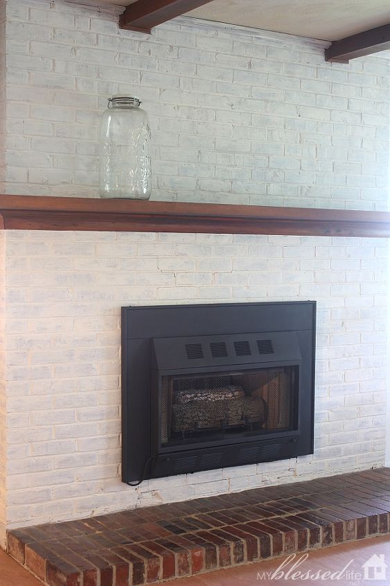 transform a brick fireplace with a white wash before after, concrete masonry, fireplaces mantels, painting, Didn t it turn out fabulously