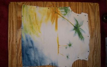 made this today from a scrap board, an old tank top, and driftwood. Art for the wall :)