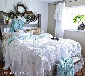 a horse gate and sawhorse for bedroom furniture, bedroom ideas, repurposing upcycling, A gate and sawhorse meant for outdoors share a life together indoors these days The bedding was created by throwing loose linens on top of a quilt Sheets were tucked in between the mattresses for a full length look How to is at