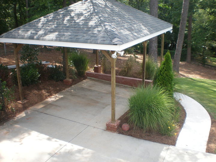 build carport over parking pad and add concrete walkway, Finished view of carport and walkway to storage pad