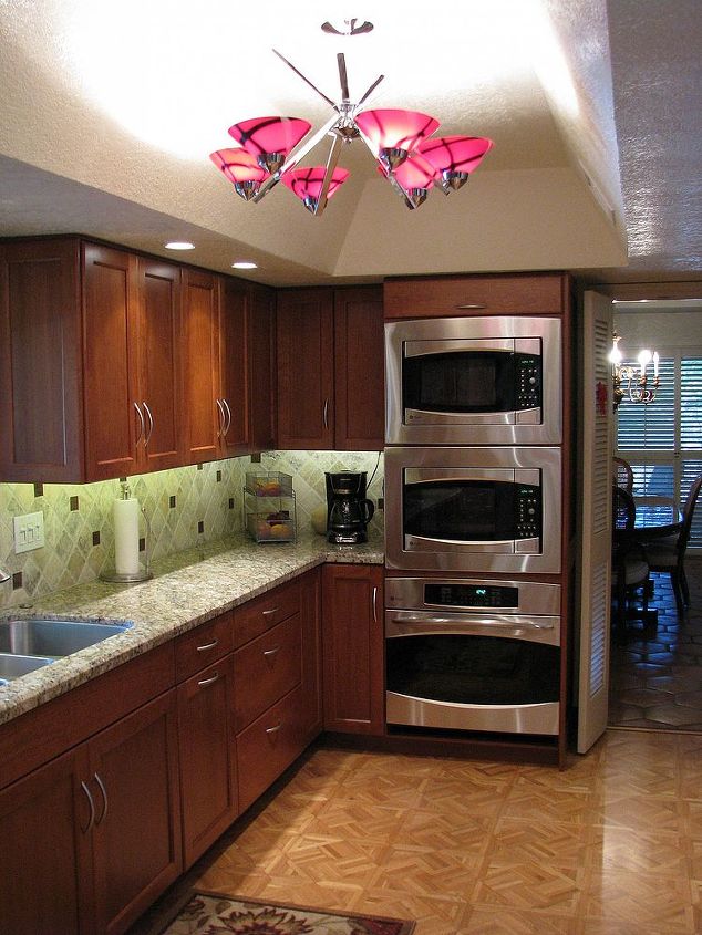 is this kitchen worth your vote, home decor, home improvement, kitchen design, Our homeowner is big on microwave cooking resulting in this unique stack of two microwaves and an oven for Thanksgiving
