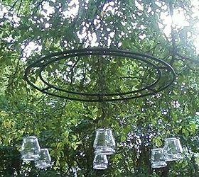 candleer, lighting, repurposing upcycling, I made this for under 10 oo Used the rings from our old worn out fire pit And old dog chains we had in the shed Some sanding black spray paint a few candle holders and S hooks Waaa Laaaaaa