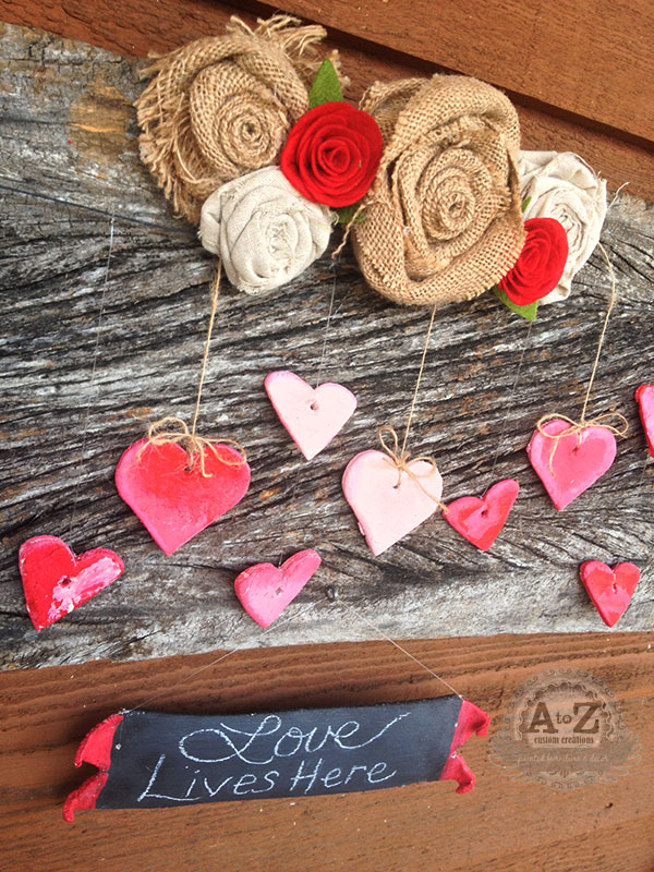 fun valentine s day decorating project to do with kids, crafts, seasonal holiday decor, valentines day ideas, The burlap roses tutorial on blog are attached with velcro so this board can be used throughout the year We ll make more salt dough cutouts for each season