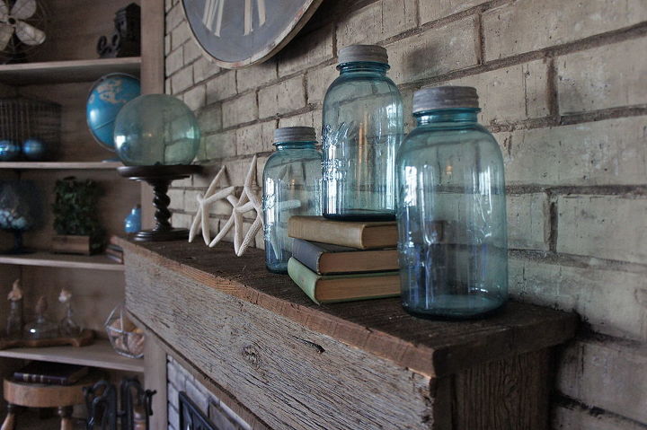 repurposed using an old barn tin roof and barn wood for a fireplace makeover, fireplaces mantels, home decor, mason jars, repurposing upcycling, Repurposed accessories and a barn wood mantle
