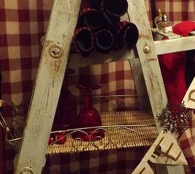 an old but sturdy vintage ladder gets some color and d cor, home decor, repurposing upcycling, rolled placemats fit snuggly in the top slot