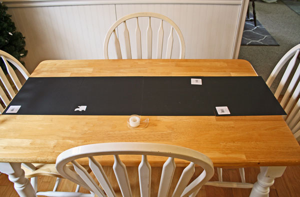 diy valentine s day table, painted furniture, seasonal holiday decor, valentines day ideas, 1 I decided to use four sheets of chalkboard scrapbook paper yes they have this isn t that awesome I laid them out on the table to the length I wanted and then just taped them together on the backside