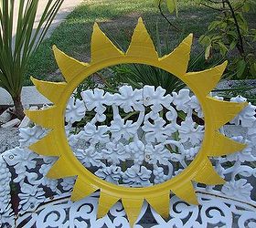 new craze old planters as miriam i has posted earlier before, gardening, repurposing upcycling, The cutout from the tire to give the planter its ending petal shape This cutout could be used as a wall decoration or what have you
