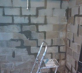time to clean up repair and re seal the storage room in the basement, basement ideas, cleaning tips, concrete masonry, wall decor, Filling