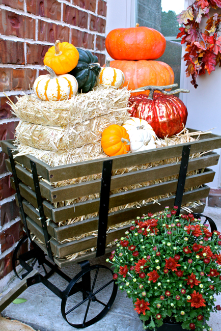decorating fall front porch seasonal pumpkins, curb appeal, porches, seasonal holiday decor, wreaths, Wagon decorated with pumpkins and barrels of hay