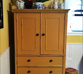 armoire turned sewing cabinet, painted furniture, repurposing upcycling, storage ideas, After painting yellow and roughing up so the original black shows through