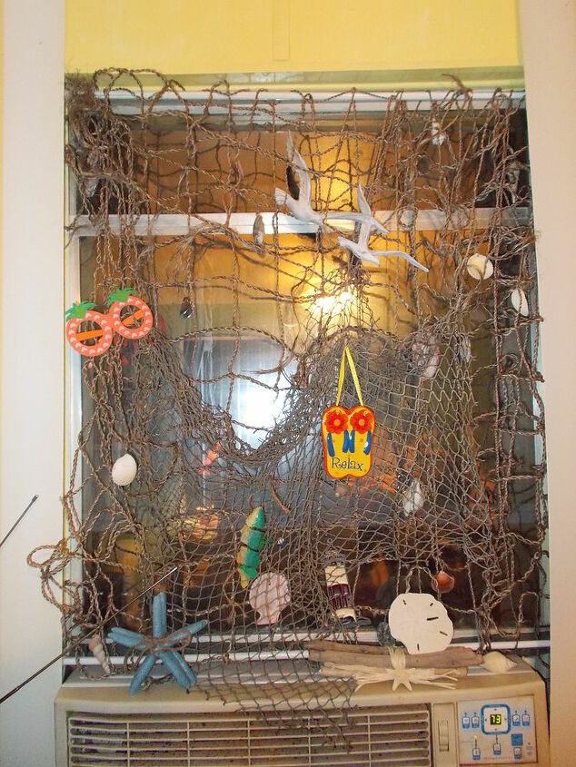 becoming living room proud, home decor, living room ideas, window treatments, my fish net window decorated
