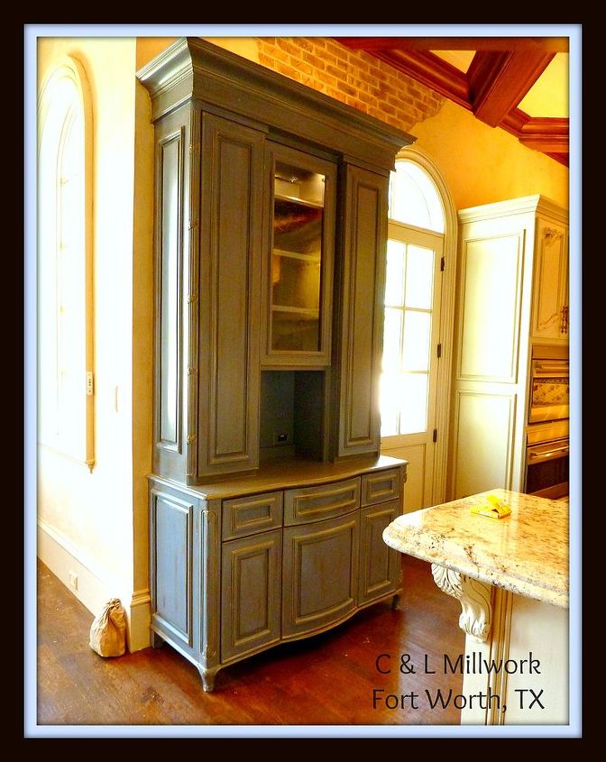 freestanding hutch in kitchen, painted furniture, distressed blue hutch in white kitchen this home was rebuilt it was burned to the ground in 2010 and this piece had originally housed an antique pendulum clock in the center which could not be salvaged after the fire