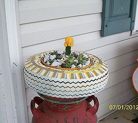 the leopart tire planter, gardening, repurposing upcycling, But then I decided the front porch would be better if I didn t want to roast it so it ended up on an old milkcan