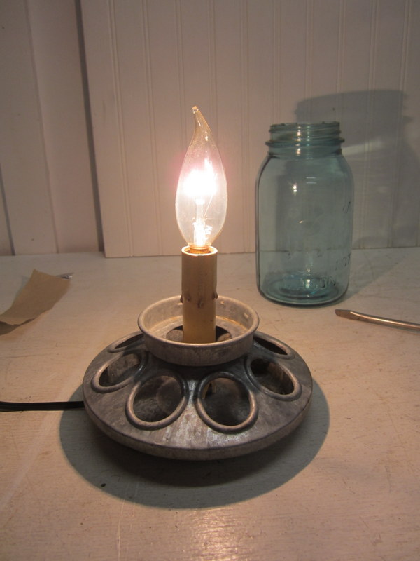 galvanized chicken feeder and mason jar repurposed into lamp, diy, lighting, mason jars, repurposing upcycling, I put the candle lamp back together after screwing the column portion of it onto the chick feeder