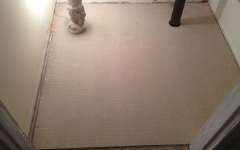 Alicatado de pisos de baño: Utilice la placa de cemento para crear una base sólida como una roca