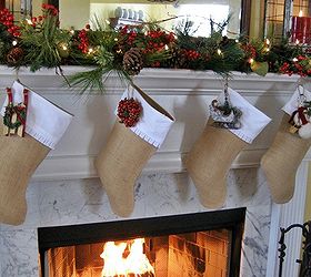 my farmhouse christmas mantel, christmas decorations, seasonal holiday decor, wreaths, handmade burlap stockings add to the farmhouse look A link to the tutorial is on my blog here