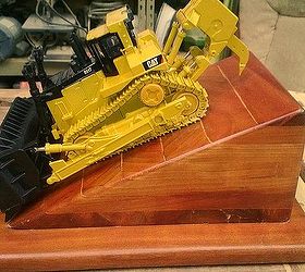this is a dozer trophy that i made for one of my dear friends, diy, woodworking projects, The dozer is a Model of a D11T from CAT that is made of metal with all working parts
