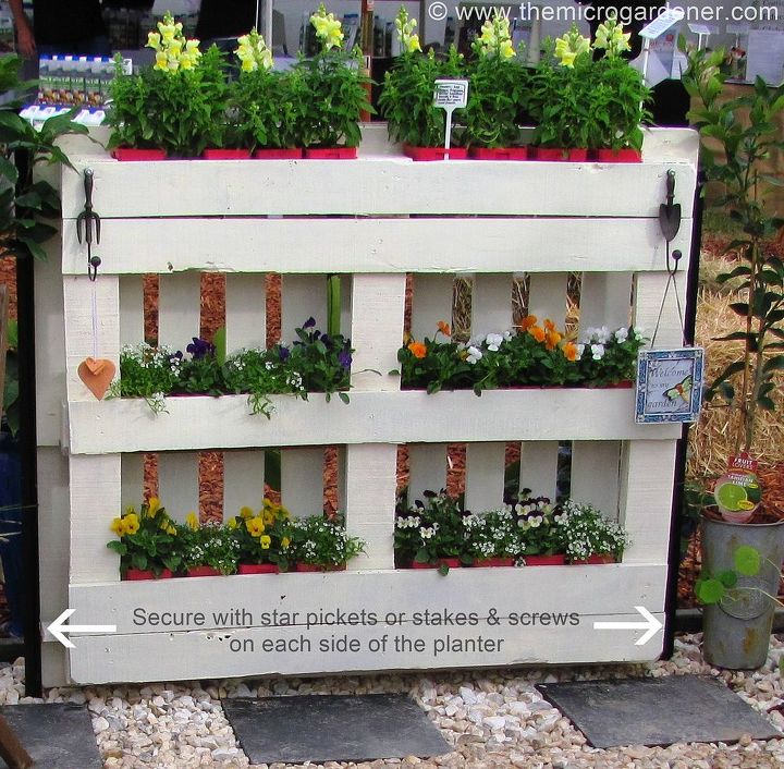 diy pallet planter, diy, gardening, how to, pallet, repurposing upcycling, succulents, woodworking projects, To secure the planter I used 2 star pickets either end but you could just as easily add horizontal timber feet at the base