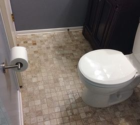 diy bathroom renovation, bathroom ideas, home improvement, painting, This photo showcases the new ceramic tile floor toilet vanity and toilet paper holder