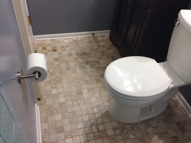 diy bathroom renovation, bathroom ideas, home improvement, painting, This photo showcases the new ceramic tile floor toilet vanity and toilet paper holder
