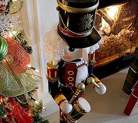our 2013 christmas mantel, christmas decorations, seasonal holiday decor, wreaths, Tall nutcrackers stand guard beside the presents