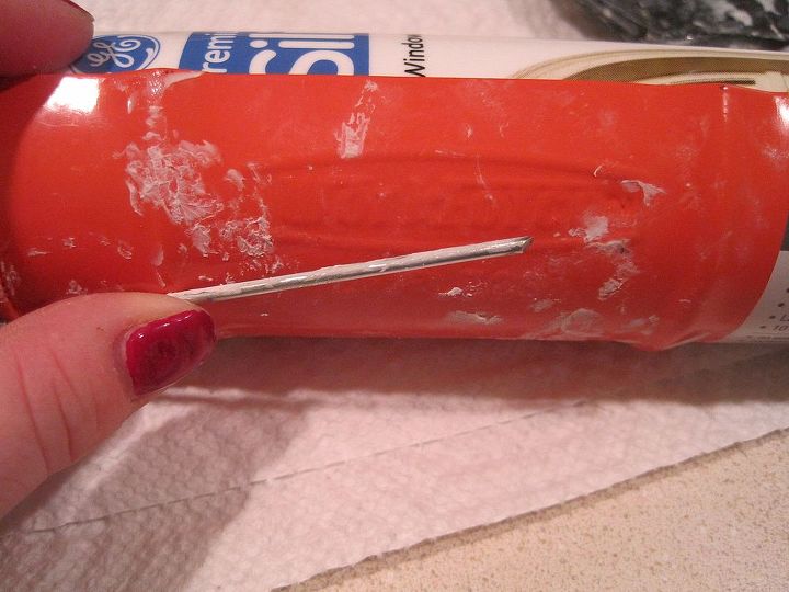 how to caulk the easy way without the mess, home maintenance repairs, how to, Also look for this little needle like do dad This guy helps you clean out the dried up caulking around the tip of your caulking tube