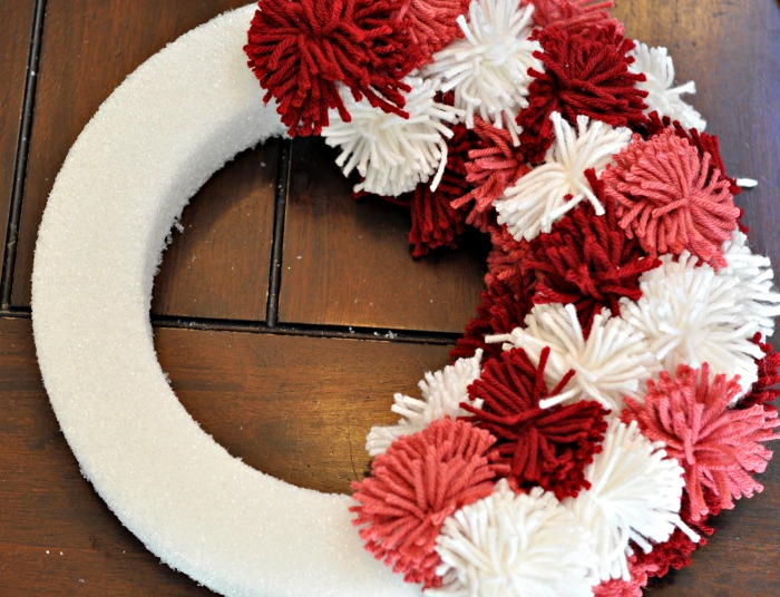 valentine s day pom pom wreath, crafts, seasonal holiday decor, valentines day ideas, wreaths, Head to blog post to see how I arranged the different colours of yarn