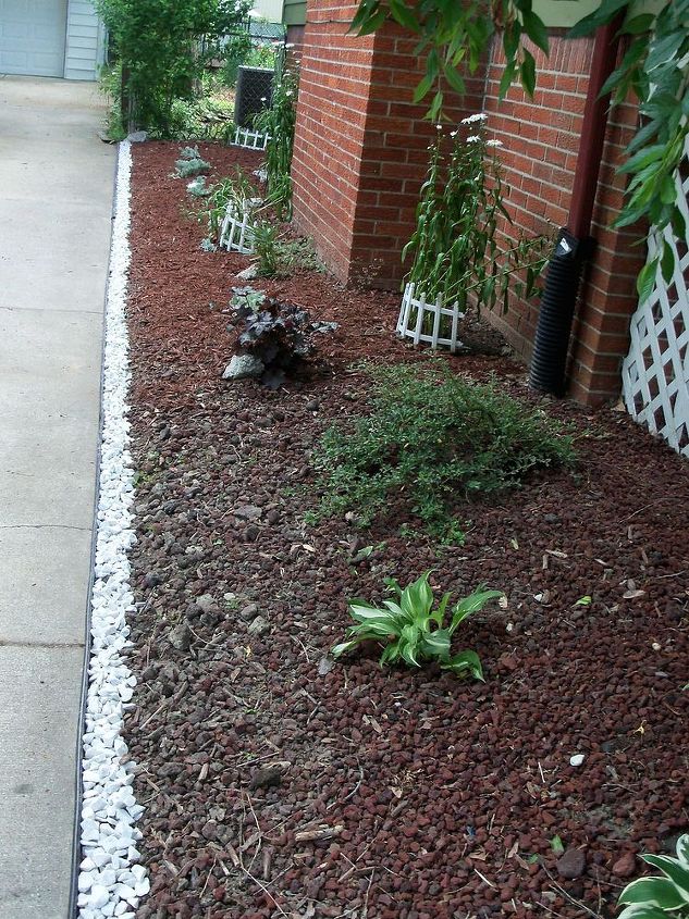 you have the edge landscaping the small space along the driveway