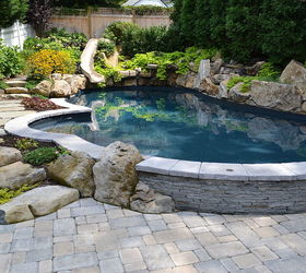 want to see an awesome pool and spa in a small backyard, landscape, outdoor living, ponds water features, pool designs, spas, Swimming pool Pulled up out of the patio to create a seatwall so friends can sit right at the waters edge
